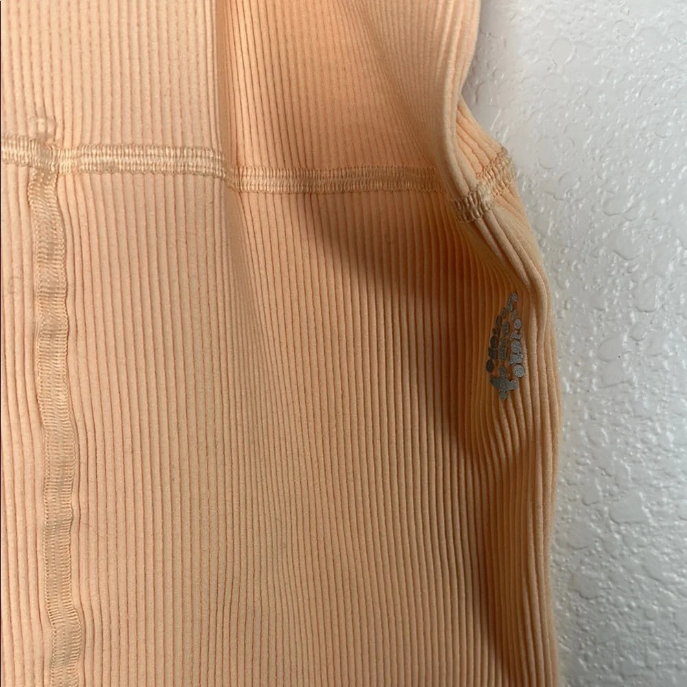Free People Movement Good Karma Romper Peach Ribbed Cross Back Bodysuit M/L - Picture 2 of 8